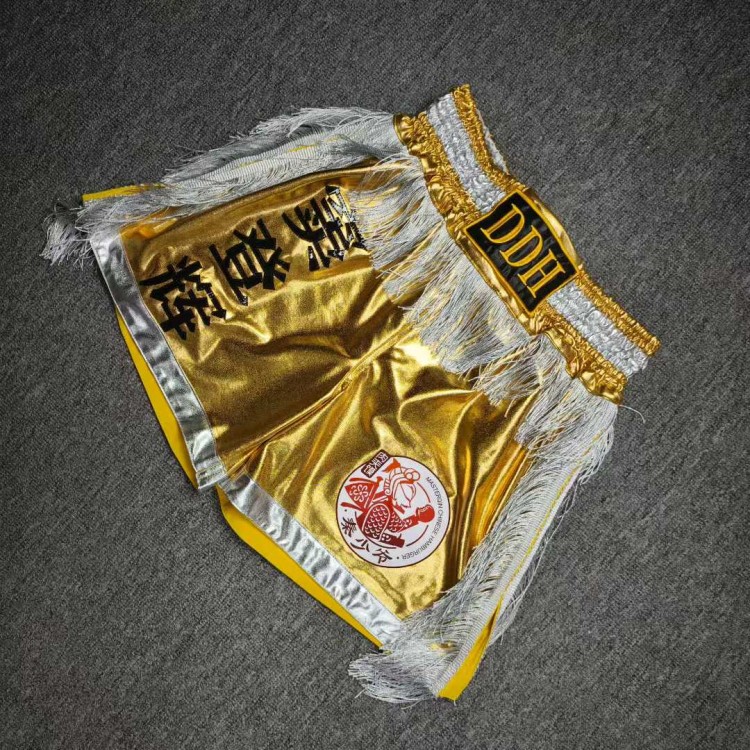 Gold Satin Martial Arts Shorts MMA/Kickboxing Trunks | White Fringe Combat Gear for Competition Gold Satin Martial Arts Shorts MMA/Kickboxing Trunks | White Fringe Combat Gear for Competition