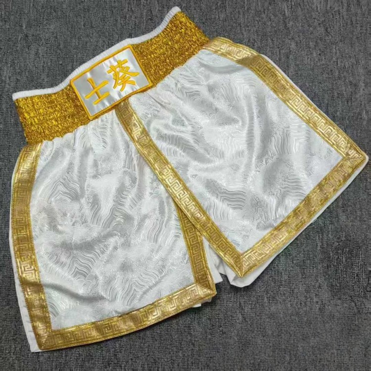 White Brocade Boxing Shorts with Text & Gold Trim Accents Fight Trunks White Brocade Boxing Shorts with Text & Gold Trim Accents Fight Trunks